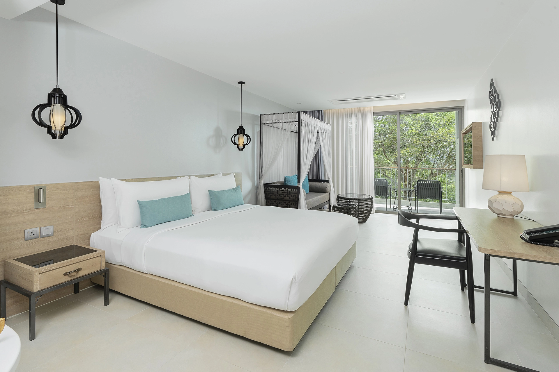 grand-deluxe-room-king-bed-window-couch-patong