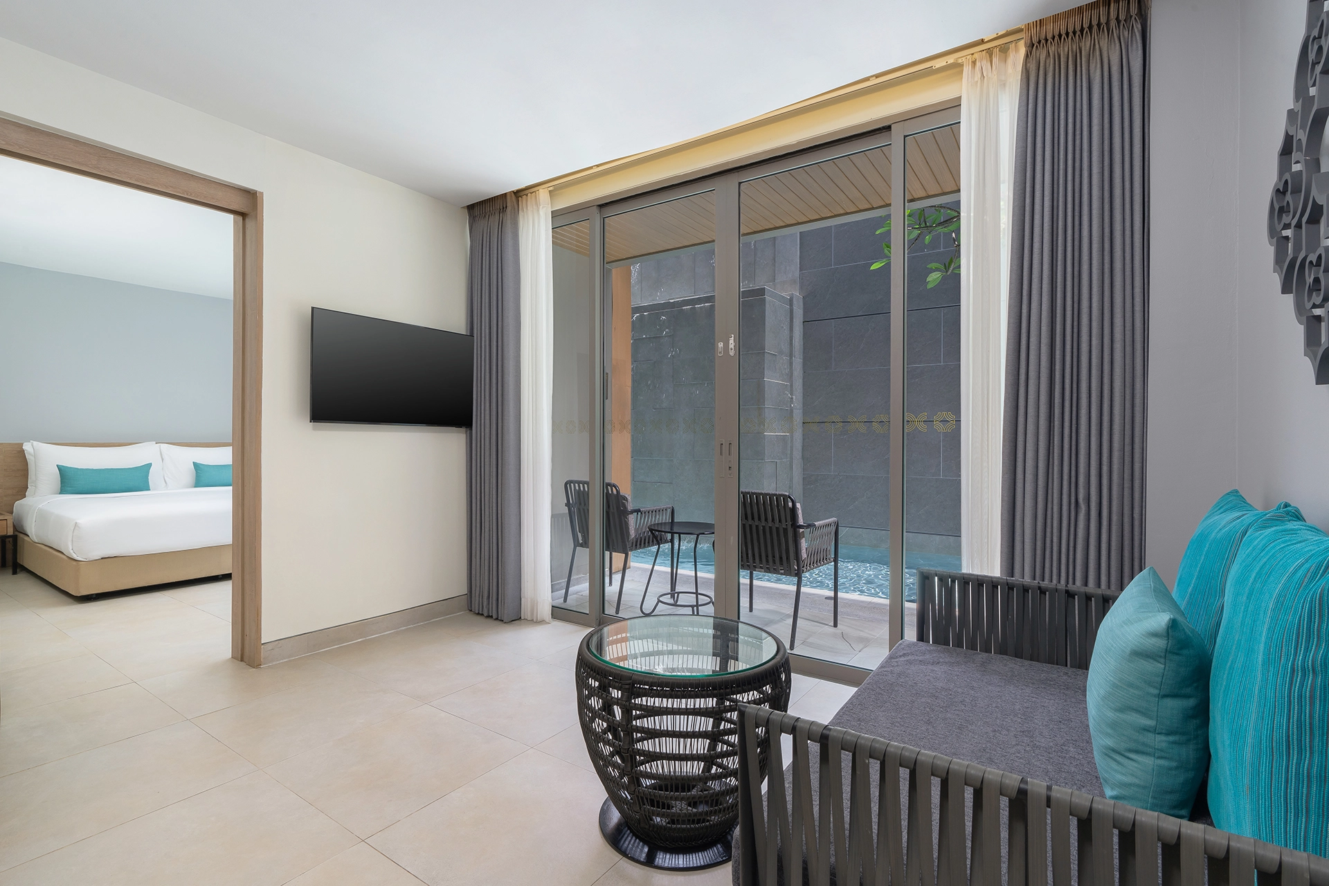 one-bedroom-suite-separate-living-room-pool-access
